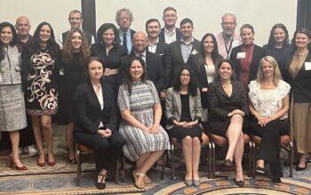 Photo of approximately 40 people posing for the camera at the 2024 DHHBA Conference.